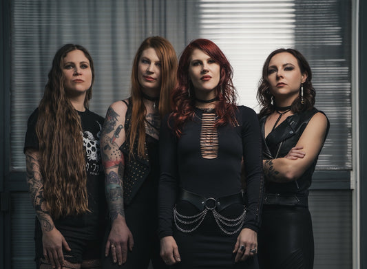 Kittie Show Their Scrap On the New Single, "One Foot In the Grave"